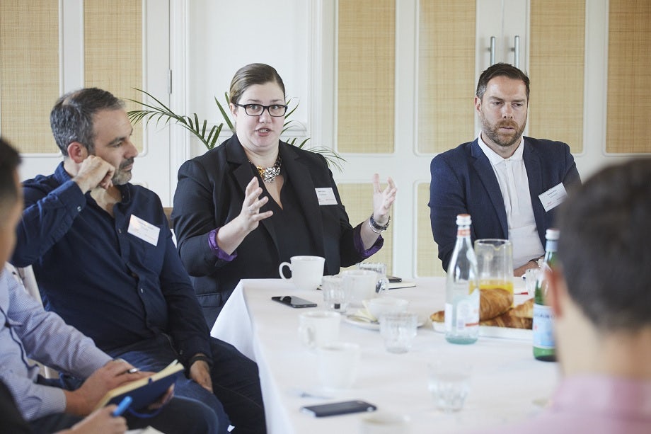 Close-up of marketers discussing the customer journey at the Facebook roundtable