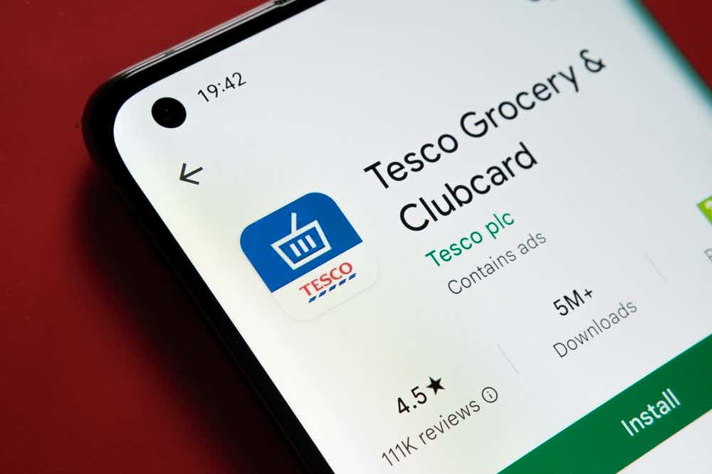 Smartphone screen displaying Tesco Clubcard app.
